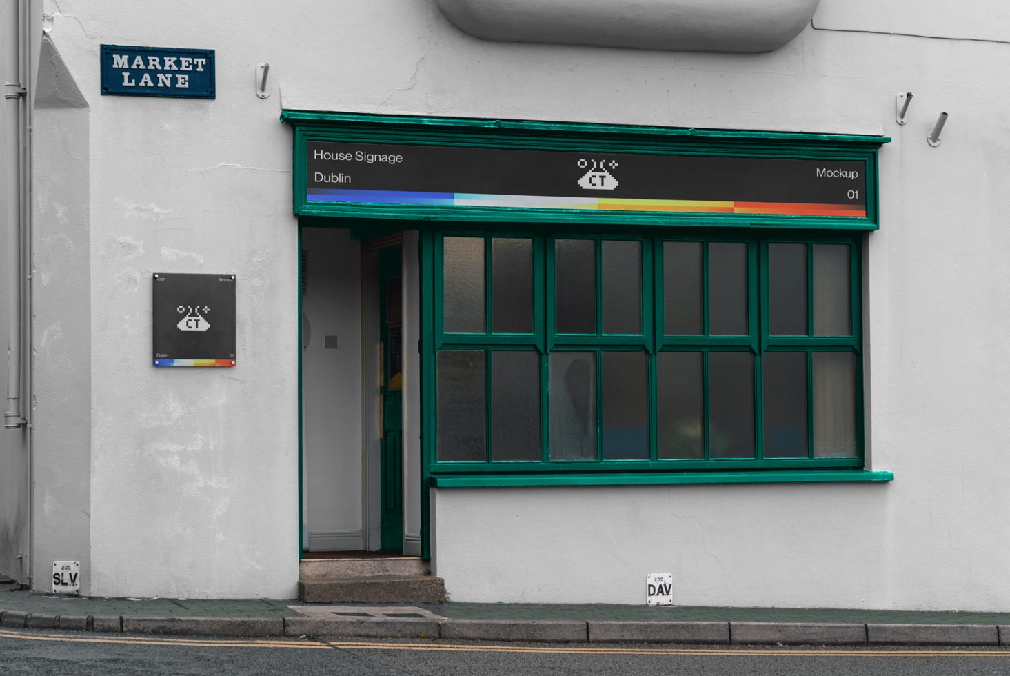 Mockup of storefront signage on a white wall with green framing under a "Market Lane" street sign, labeled for design versatility.